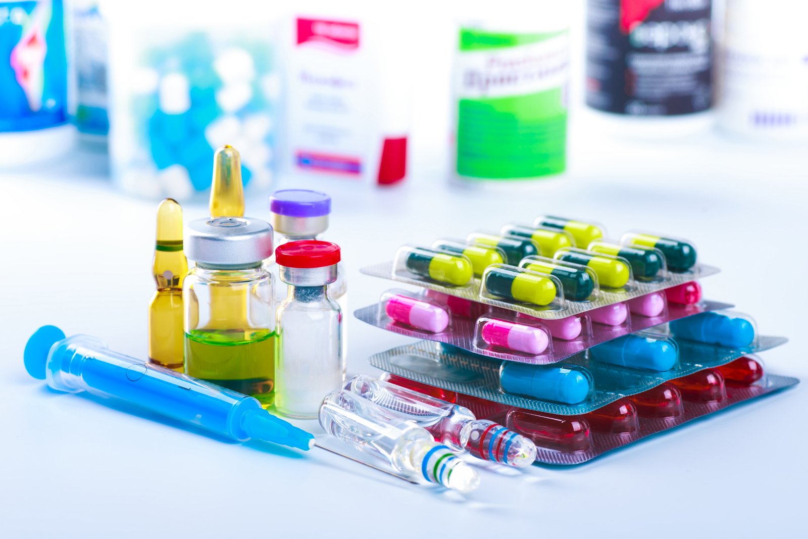 Insulin pen and blood testing lancet representing diabetes treatment costs